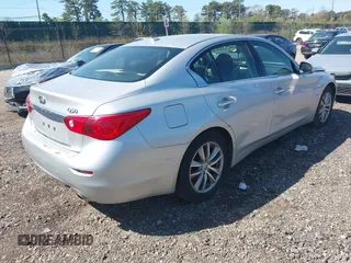 2015 Infiniti Q50 with VIN JN1BV7AR3FM416371, listed as a IAAI auction lot 42036139 with 76,239 mi miles and . Bid and sale history available at DreamBid. Image 4.