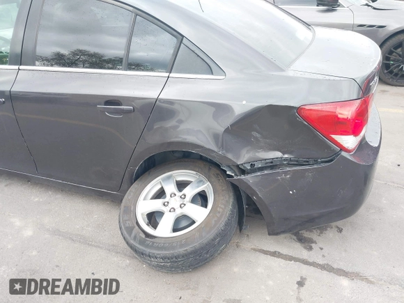 2014 Chevrolet Cruze 1LT with VIN 1G1PC5SB4E7134678, listed as a IAAI auction lot 42171165 with 125,225 mi miles and . Bid and sale history available at DreamBid. Image 6.