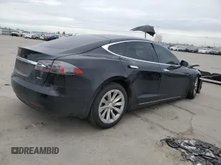 2018 Tesla Model S 75D with VIN 5YJSA1E29JF293521, listed as a Copart auction lot 50104625 with 93,428 mi miles and Salvage Title. Bid and sale history available at DreamBid. Image 3.