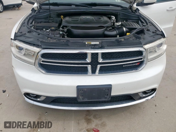 2018 Dodge Durango SXT with VIN 1C4RDHAG0JC329075, listed as a Copart auction lot 56966855 with 176,403 mi miles and Salvage title. Bid and sale history available at DreamBid. Image 12.