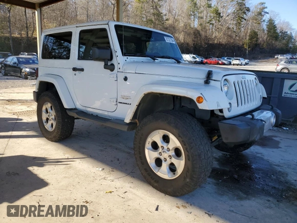2014 Jeep Wrangler Sahara with VIN 1C4AJWBG1EL168007, listed as a Copart auction lot 87331394 with 113,228 mi miles and Salvage Title. Bid and sale history available at DreamBid. Image 4.