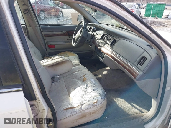 1997 Mercury Grand Marquis LS with VIN 2MELM75W5VX715872, listed as a IAAI auction lot 41612631 with 202,743 mi miles and . Bid and sale history available at DreamBid. Image 5.