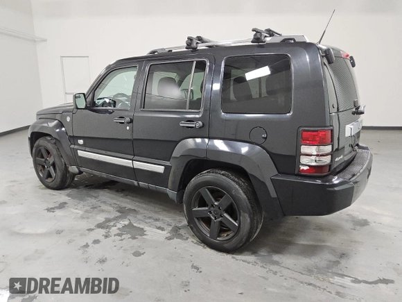 2011 Jeep Liberty Sport 70th Anniversary with VIN 1J4PN2GK5BW558133, listed as a Copart auction lot 52900925 with 119,803 mi miles and Clean Title. Bid and sale history available at DreamBid. Image 2.