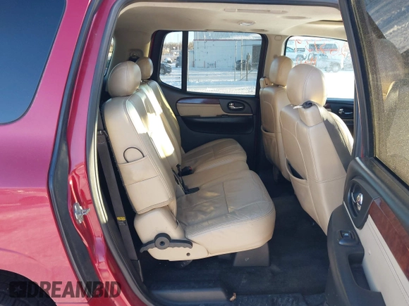 2005 GMC Envoy SLE with VIN 1GKET16S056147701, listed as a IAAI auction lot 41263739 with 179,455 mi miles. Bid and sale history available at carsss.com. Image 8.