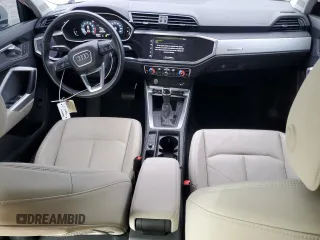 2020 Audi Q3 S line Premium z VIN WA1DECF31L1122011, wystawiony jako Copart lot #50725195 z przebiegiem 47 567 mil mil oraz Szkody całkowita. Historia ofert i sprzedaży dostępna na DreamBid. Obrazek 8.