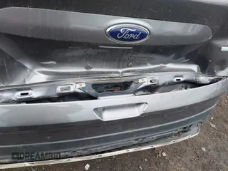 2013 Ford Escape SE with VIN 1FMCU9GX4DUB35629, listed as a IAAI auction lot 42446685 with 103,420 mi miles and . Bid and sale history available at DreamBid. Image 6.