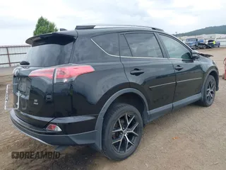 2018 Toyota RAV4 SE with VIN 2T3JFREV1JW730203, listed as a IAAI auction lot 42504455 with 99,442 mi miles and . Bid and sale history available at DreamBid. Image 4.