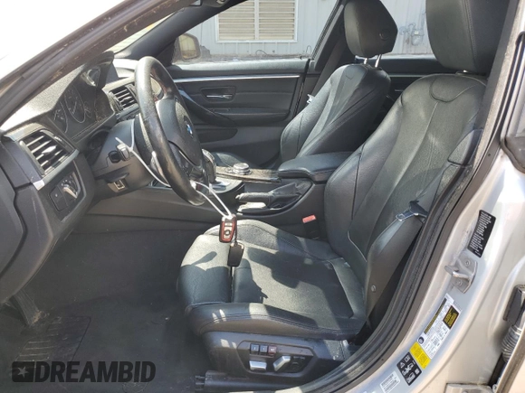 2016 BMW 4 Series 428i xDrive z VIN WBA4C9C52GG136035, wystawiony jako Copart lot #52501455 z przebiegiem 181 086 mil mil oraz Szkoda całkowita • Salvage title. Historia ofert i sprzedaży dostępna na DreamBid. Obrazek 7.