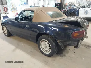 1996 Mazda MX-5 Miata z VIN JM1NA3534T0708649, wystawiony jako IAAI lot #42369564 z przebiegiem 202 690 mil mil oraz . Historia ofert i sprzedaży dostępna na DreamBid. Obrazek 3.