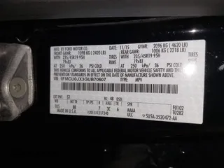 2016 Ford Escape Titanium with VIN 1FMCU0JX3GUB70607, listed as a IAAI auction lot 41727421 with 106,857 mi miles. Bid and sale history available at carsss.com. Image 9.