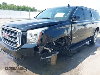 2016 GMC Yukon XL SLE with VIN 1GKS1FKC9GR161876, listed as a IAAI auction lot 39948106 with 60,800 mi miles. Bid and sale history available at carsss.com. Image 6.