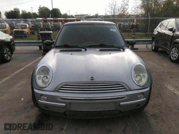 2002 MINI Hardtop with VIN WMWRC33432TE10226, listed as a IAAI auction lot 41973956 with 156,445 mi miles and . Bid and sale history available at DreamBid. Image 12.