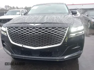 2022 Genesis GV80 with VIN KMUHCESC0NU083778, listed as a IAAI auction lot 41553215 with 93,384 mi miles and . Bid and sale history available at DreamBid. Image 6.