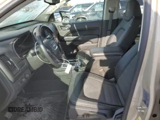 2021 GMC Canyon 4WD AT4 z VIN 1GTG6FEN8M1157828, wystawiony jako Copart lot #88392435 z przebiegiem 45 252 mil mil oraz Szkody całkowita. Historia ofert i sprzedaży dostępna na DreamBid. Obrazek 7.