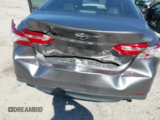 2019 Toyota Camry LE with VIN 4T1B11HK4KU286959, listed as a IAAI auction lot 42063344 with 92,481 mi miles and . Bid and sale history available at DreamBid. Image 6.