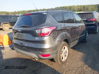 2018 Ford Escape SEL with VIN 1FMCU9HD0JUC25036, listed as a IAAI auction lot 40518589 with 143,076 mi miles. Bid and sale history available at carsss.com. Image 4.