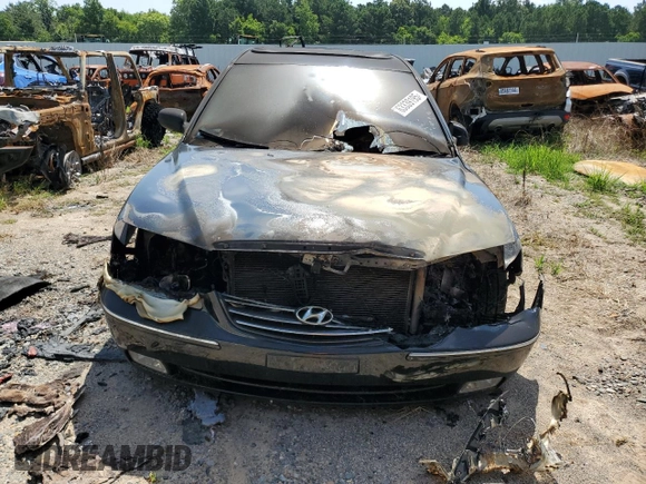 2006 Hyundai Azera SE z VIN KMHFC46F56A035393, wystawiony jako Copart lot #63339195 z przebiegiem Nie podano mil oraz Szkoda całkowita • Salvage title. Historia ofert i sprzedaży dostępna na DreamBid. Obrazek 5.