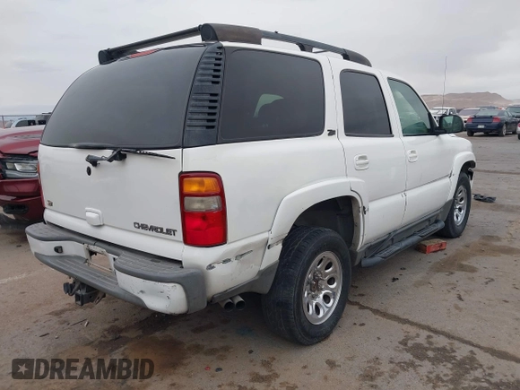 2002 Chevrolet Tahoe Z71 with VIN 1GNEK13Z22R303223, listed as a IAAI auction lot 41527148 with 211,835 mi miles. Bid and sale history available at carsss.com. Image 4.