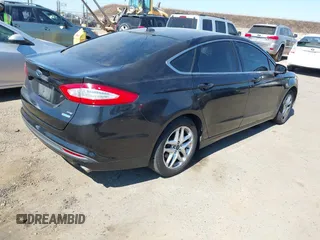 2013 Ford Fusion SE z VIN 3FA6P0HRXDR220248, wystawiony jako IAAI lot #42777273 z przebiegiem 156 603 mil mil oraz . Historia ofert i sprzedaży dostępna na DreamBid. Obrazek 4.