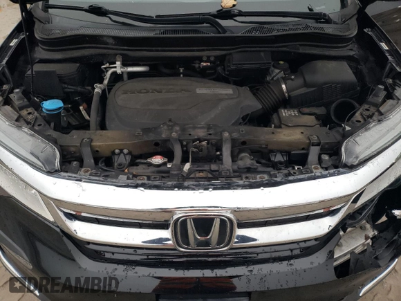2020 Honda Pilot Touring 7-Passenger z VIN 5FNYF6H67LB003593, wystawiony jako Copart lot #83658334 z przebiegiem 105 575 mil mil oraz Szkoda całkowita • Salvage title. Historia ofert i sprzedaży dostępna na DreamBid. Obrazek 12.
