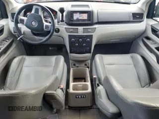 2014 Volkswagen Routan SE with VIN 2C4RVABG7ER134462, listed as a Copart auction lot 76492444 with 93,373 mi miles and Salvage title. Bid and sale history available at DreamBid. Image 8.