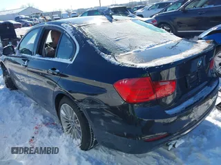 2014 BMW 3 Series 328i with VIN WBA3A5C50EJ464645, listed as a IAAI auction lot 41268979 with 120,980 mi miles. Bid and sale history available at carsss.com. Image 3.