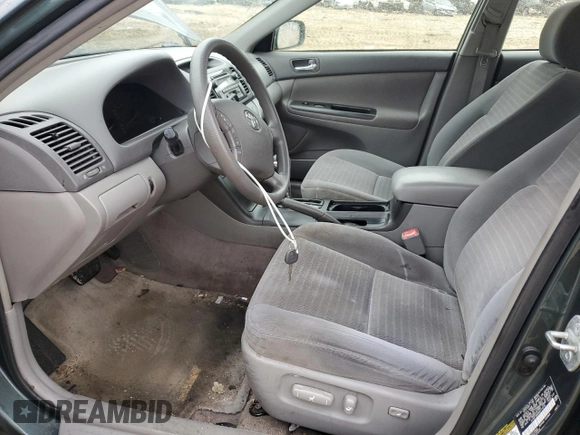 2006 Toyota Camry LE z VIN 4T1BF30K66U111210, wystawiony jako Copart lot #53107095 z przebiegiem 214 638 mil mil oraz Szkoda całkowita • Salvage title. Historia ofert i sprzedaży dostępna na DreamBid. Obrazek 7.