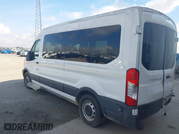 2016 Ford Transit XL z VIN 1FDZX2CM0GKB22459, wystawiony jako IAAI lot #40693295 z przebiegiem 302 216 mil mil oraz . Historia ofert i sprzedaży dostępna na DreamBid. Obrazek 3.