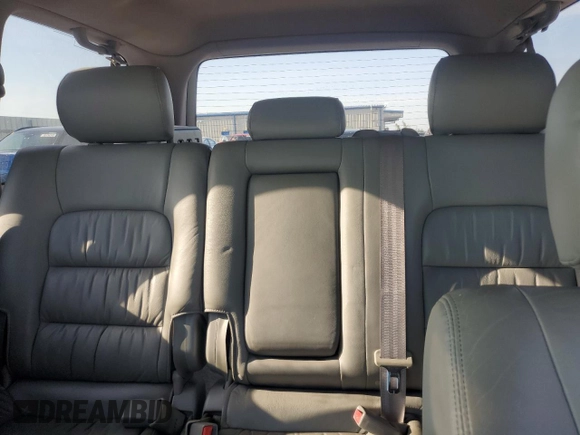 2006 Lexus LX 470 z VIN JTJHT00W864007291, wystawiony jako Copart lot #57331555 z przebiegiem 142 194 mil mil oraz Szkoda całkowita • Salvage title. Historia ofert i sprzedaży dostępna na DreamBid. Obrazek 10.