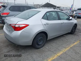 2015 Toyota Corolla L with VIN 5YFBURHE6FP259379, listed as a IAAI auction lot 42153082 with 185,294 mi miles and . Bid and sale history available at DreamBid. Image 4.