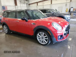 2016 MINI Clubman z VIN WMWLN5C53G2B35247, wystawiony jako Copart lot #56463705 z przebiegiem 107 227 mil mil oraz Nie do naprawy. Historia ofert i sprzedaży dostępna na DreamBid. Obrazek 4.