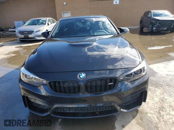 2019 BMW M4 with VIN WBS4Y9C57KAG67209, listed as a Copart auction lot 44204445 with 52,605 mi miles and Salvage Title. Bid and sale history available at carsss.com. Image 5.