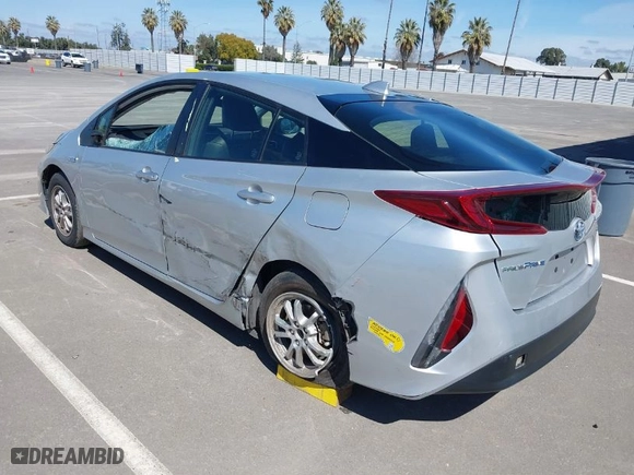 2021 Toyota Prius Prime LE with VIN JTDKAMFP4M3175051, listed as a IAAI auction lot 41856383 with 106,642 mi miles. Bid and sale history available at carsss.com. Image 3.