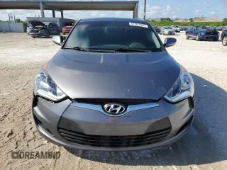 2016 Hyundai Veloster z VIN KMHTC6AD7GU300528, wystawiony jako Copart lot #57501955 z przebiegiem 72 437 mil mil oraz Szkoda całkowita • Salvage title. Historia ofert i sprzedaży dostępna na DreamBid. Obrazek 5.