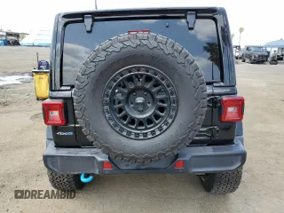 2024 Jeep Wrangler Sahara with VIN 1C4RJXP60RW116607, listed as a Copart auction lot 54562695 with 62,352 mi miles and Salvage title. Bid and sale history available at DreamBid. Image 6.