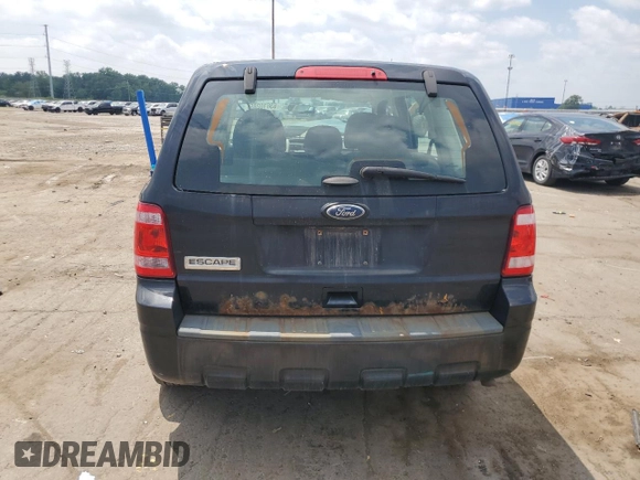 2011 Ford Escape XLS z VIN 1FMCU0C78BKB77957, wystawiony jako Copart lot #63610285 z przebiegiem 180 578 mil mil oraz Czysty tytuł • Clean title. Historia ofert i sprzedaży dostępna na DreamBid. Obrazek 6.