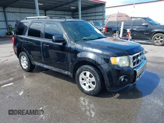2010 Ford Escape Limited z VIN 1FMCU0E76AKC59116, wystawiony jako IAAI lot #42232660 z przebiegiem 308 903 mil mil oraz . Historia ofert i sprzedaży dostępna na DreamBid. Obrazek 1.