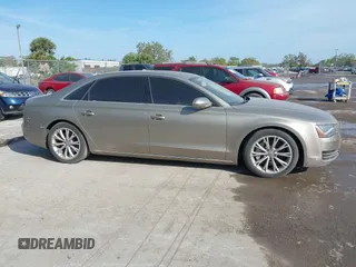 2012 Audi A8 z VIN WAURVAFD3CN024063, wystawiony jako IAAI lot #41706508 z przebiegiem Nie podano mil oraz . Historia ofert i sprzedaży dostępna na DreamBid. Obrazek 13.