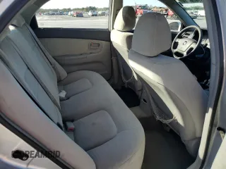 2006 Kia Spectra EX with VIN KNAFE121965372856, listed as a Copart auction lot 77365514 with 316,947 mi miles and Clean Title. Bid and sale history available at carsss.com. Image 10.