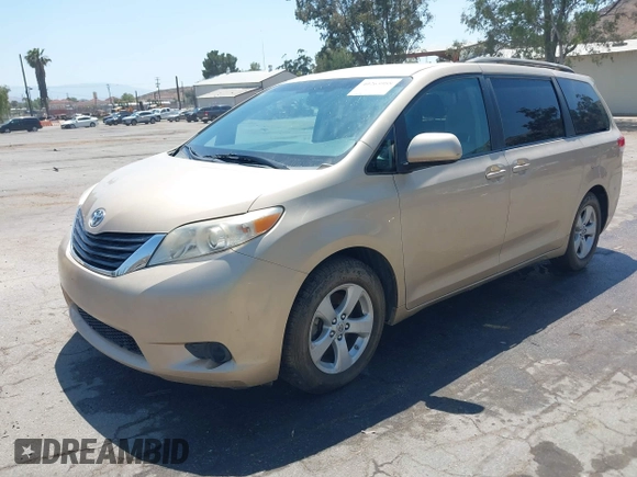 2012 Toyota Sienna LE AAS with VIN 5TDKK3DC5CS186077, listed as a IAAI auction lot 40265988 with 130,888 mi miles and . Bid and sale history available at DreamBid. Image 2.