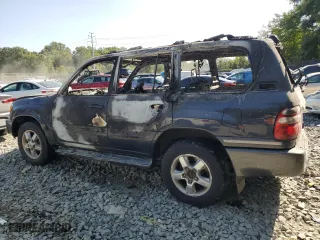 2003 Toyota Land Cruiser with VIN JTEHT05J332044364, listed as a Copart auction lot 70952174 with 0 mi miles and Salvage Title. Bid and sale history available at carsss.com. Image 2.