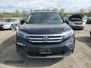 2017 Honda Pilot Elite with VIN 5FNYF6H09HB104654, listed as a Copart auction lot 55320795 with 187,306 mi miles and Clean Title. Bid and sale history available at DreamBid. Image 5.