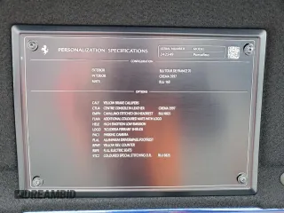 2019 Ferrari Portofino z VIN ZFF89FPAXK0242549, wystawiony jako Copart lot #74454234 z przebiegiem Nie podano mil oraz Nie do naprawy. Historia ofert i sprzedaży dostępna na DreamBid. Obrazek 12.