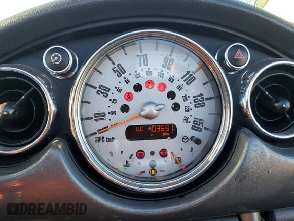 2007 MINI Convertible S with VIN WMWRH33587TJ43499, listed as a Copart auction lot 76266684 with 103,691 mi miles and Salvage title. Bid and sale history available at DreamBid. Image 9.