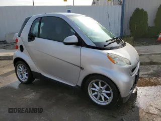 2008 Smart fortwo Pure with VIN WMEEJ31X78K151323, listed as a Copart auction lot 60921075 with 65,738 mi miles and Clean title. Bid and sale history available at DreamBid. Image 4.