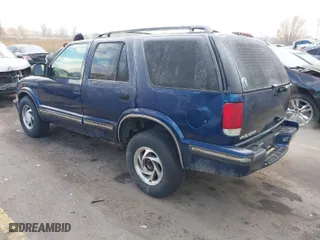 1999 Chevrolet Blazer LS with VIN 1GNDT13W0X2223207, listed as a IAAI auction lot 41352241 with 239,263 mi miles. Bid and sale history available at carsss.com. Image 3.