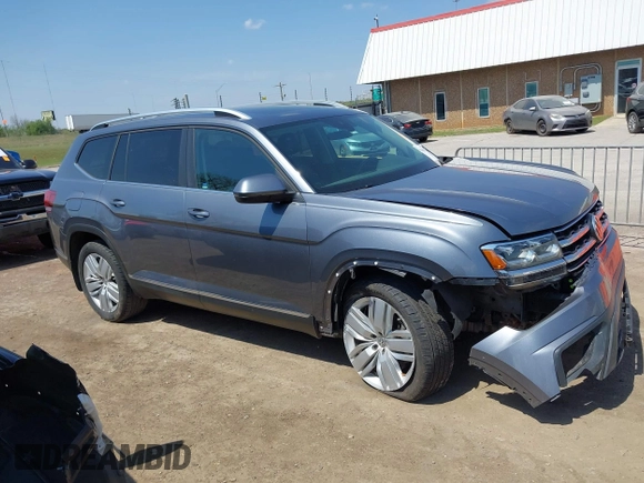 2019 Volkswagen Atlas SEL z VIN 1V2ER2CA5KC555568, wystawiony jako IAAI lot #42050516 z przebiegiem 71 599 mil mil oraz . Historia ofert i sprzedaży dostępna na DreamBid. Obrazek 13.