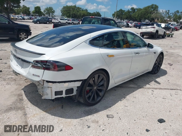 2017 Tesla Model S 100D with VIN 5YJSA1E45HF189006, listed as a IAAI auction lot 42540693 with 64,827 mi miles and . Bid and sale history available at DreamBid. Image 4.