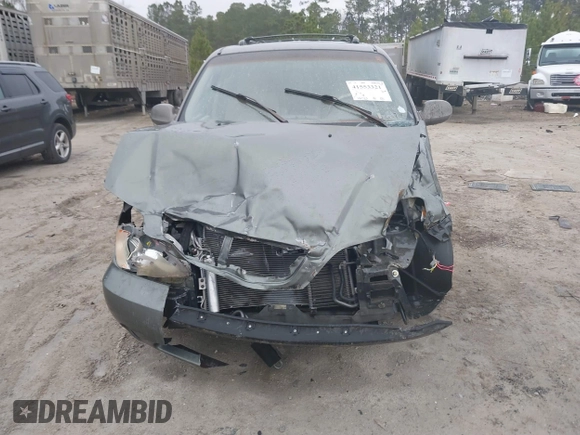 2005 Kia Sedona LX with VIN KNDUP132056674430, listed as a IAAI auction lot 41553321 with 136,734 mi miles. Bid and sale history available at carsss.com. Image 6.