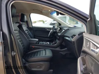 2020 Ford Edge SEL z VIN 2FMPK3J9XLBA54556, wystawiony jako IAAI lot #42179907 z przebiegiem 63 449 mil mil oraz . Historia ofert i sprzedaży dostępna na DreamBid. Obrazek 5.